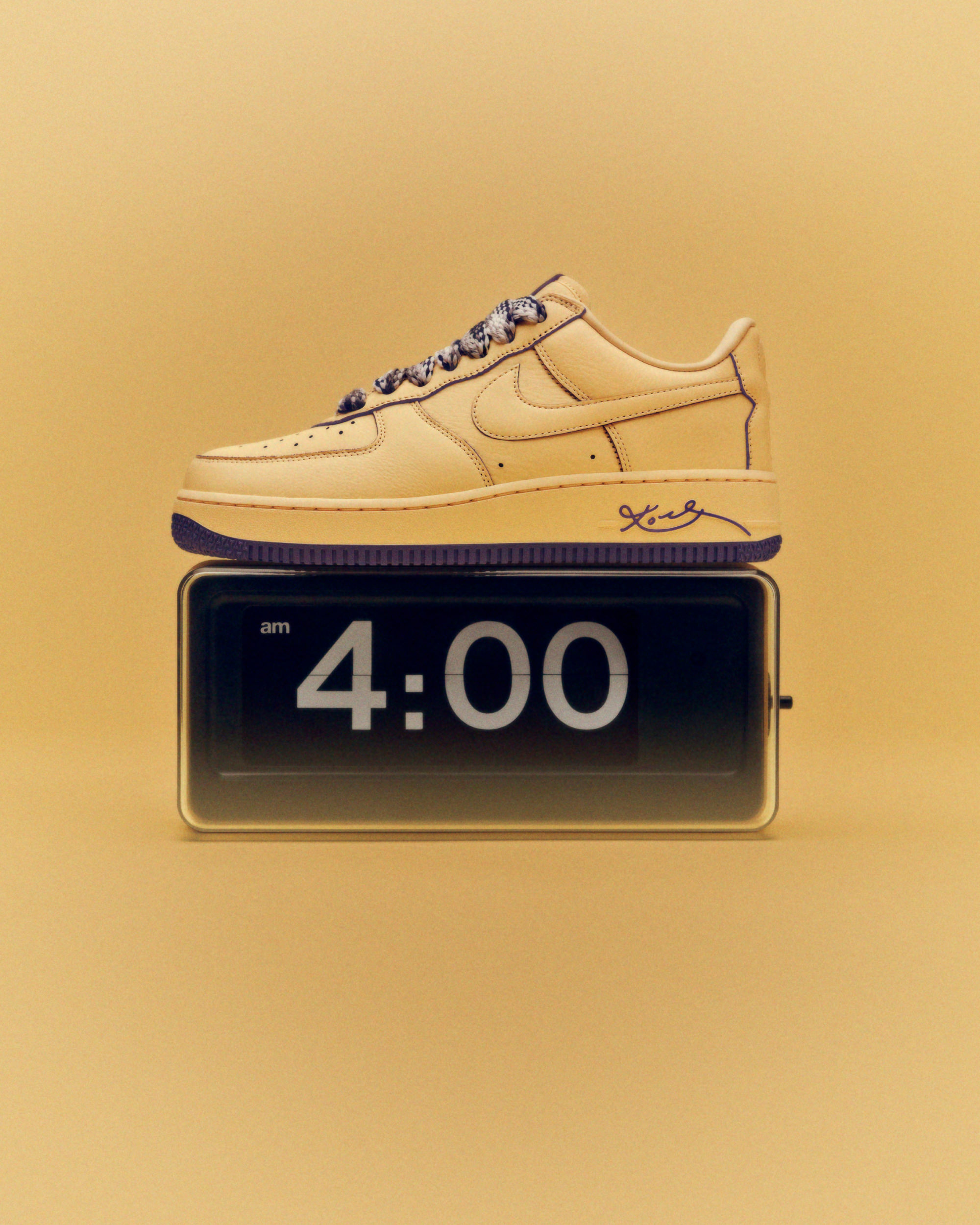 Nike Air Force 1 Protro on top of 4am alarm clock for Kobe Bryant Air Force 1 protro campaign by WØRKS