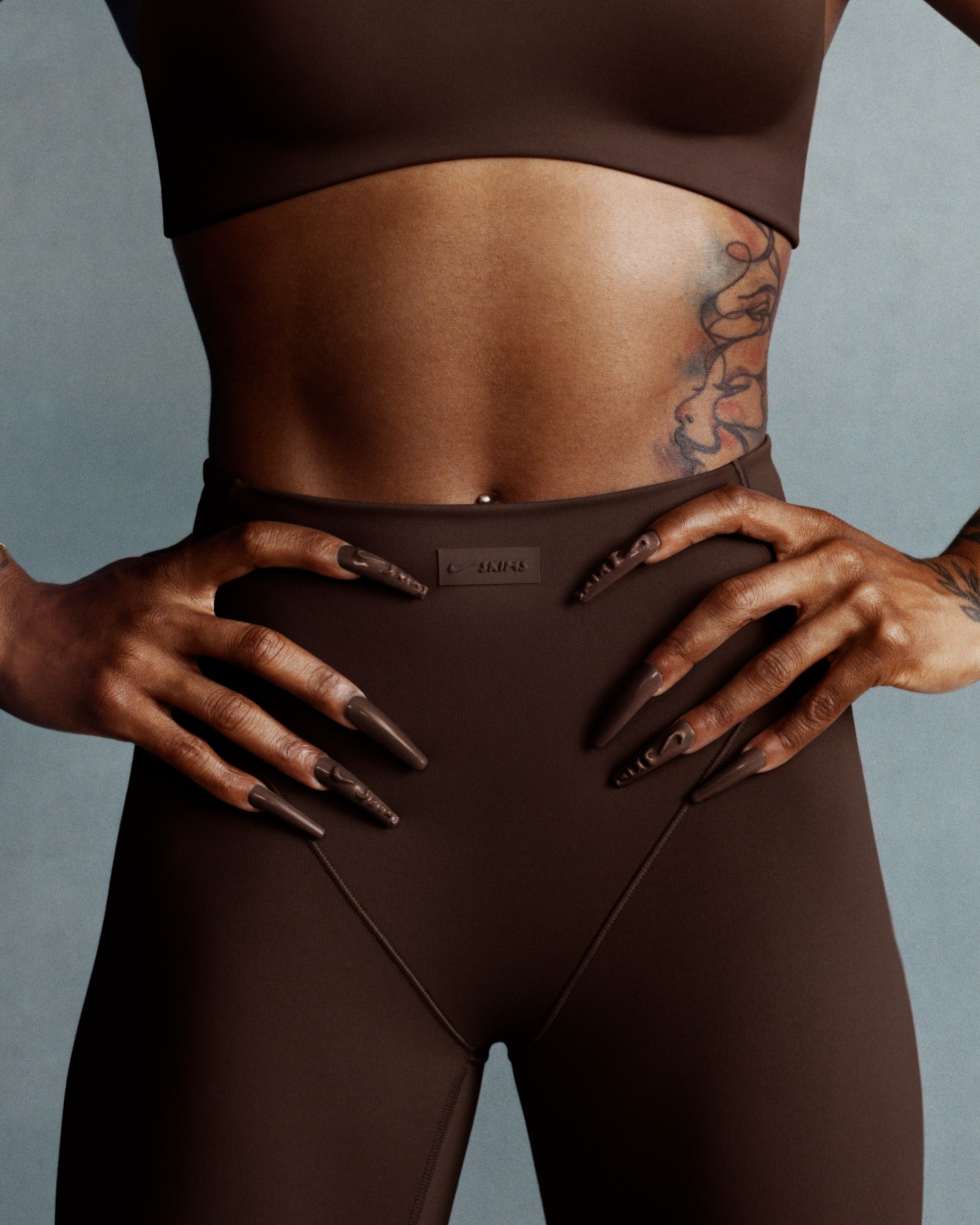 body part,hip,person,skin,adult,female,woman,back,tattoo,thigh